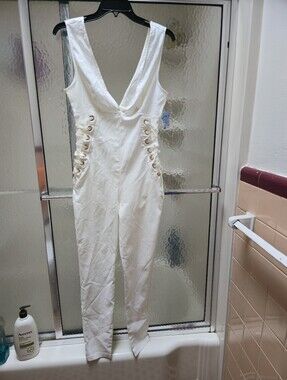 NWT Beautiful Iris White Sleeveless Lace-Up Side Jumpsuit. M. Cream color. $65